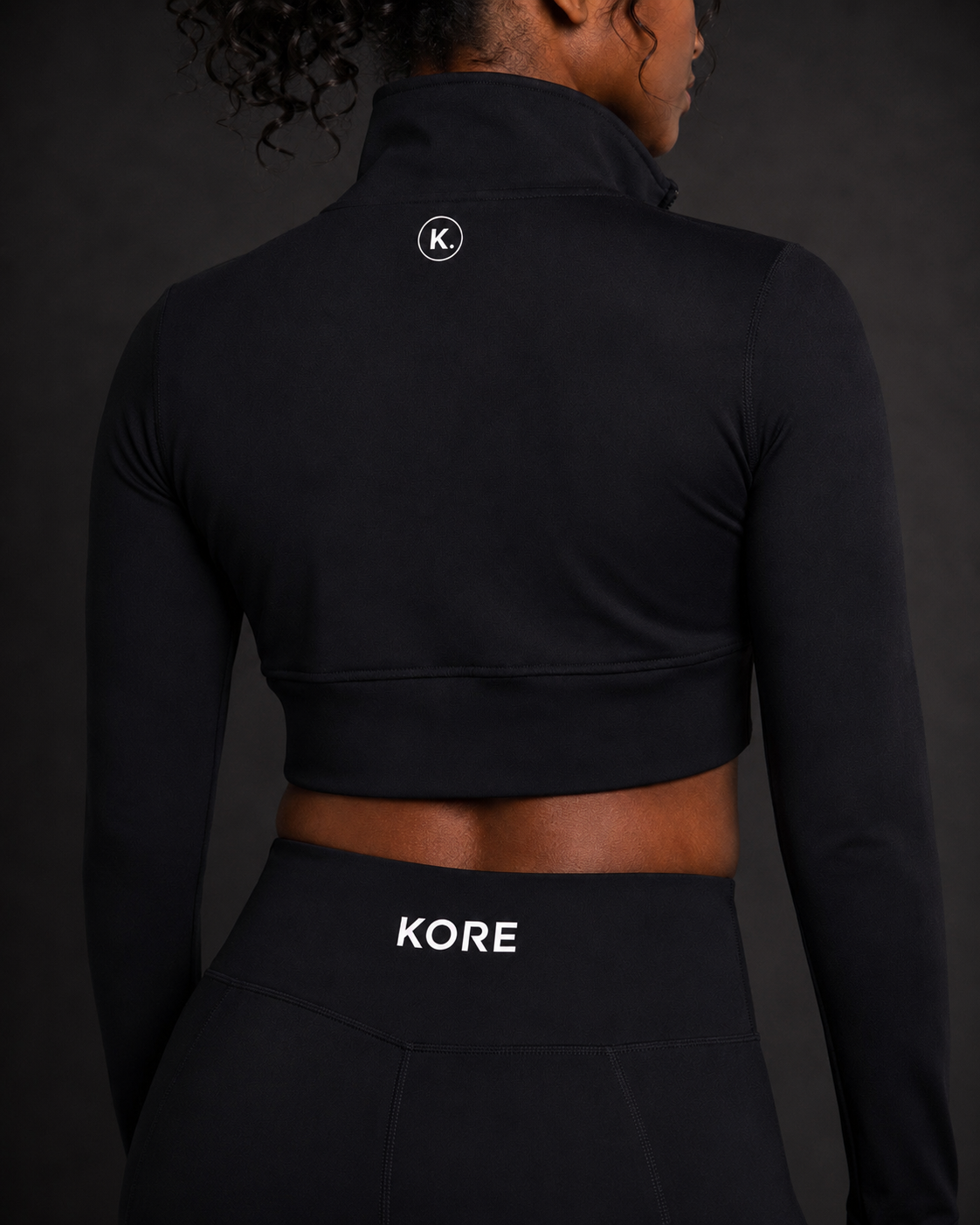 KORE Elevated Layer Jacket — back view with K. icon and KORE waistband logo